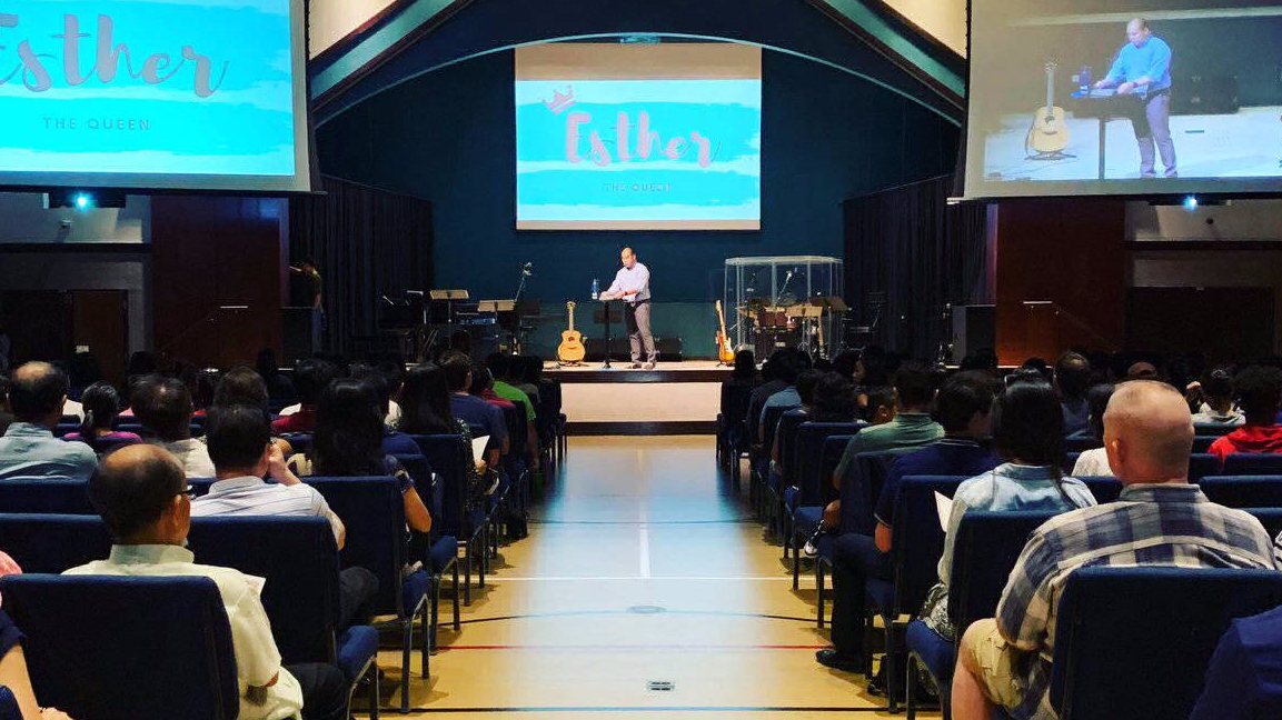 A speaker sharing a message with the FBCC congregation
